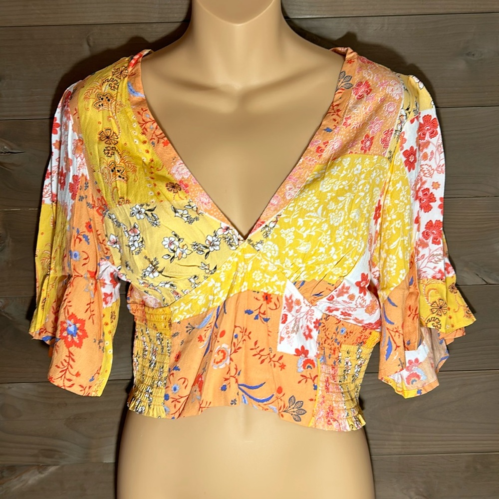 FOREVER 21 Orange and yellow Floral FLARE top. NWT